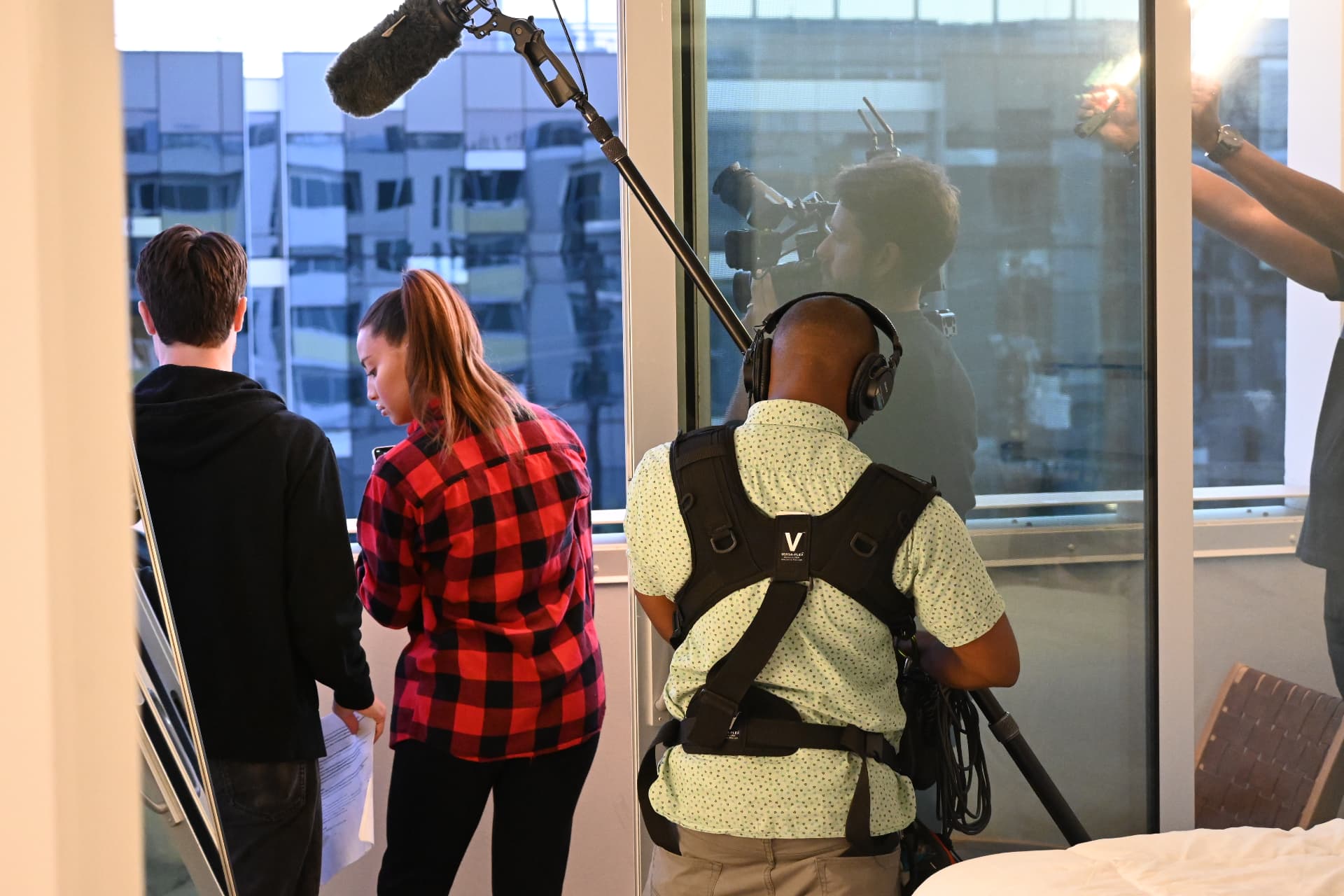 Behind the scenes with Montage Media Production Company: Boom operator and camera on a hospital room scene