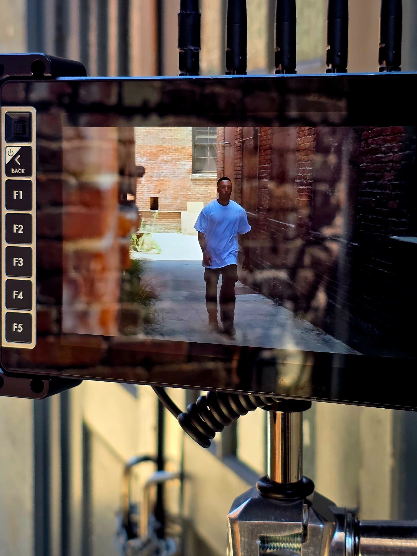 Behind the scenes with Montage Media Production Company: Monitor playback, alley walk and talk