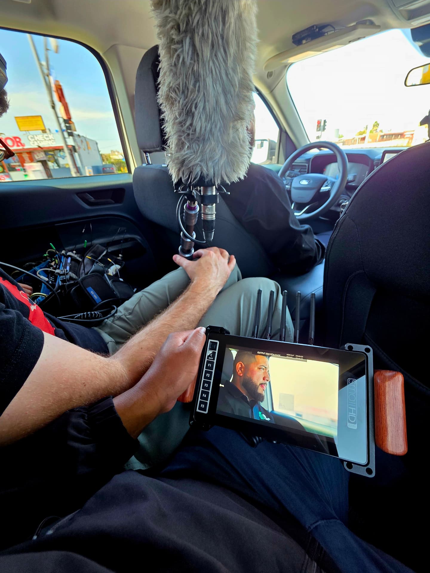 Behind the scenes with Montage Media Production Company: Boom operator, in vehicle interview