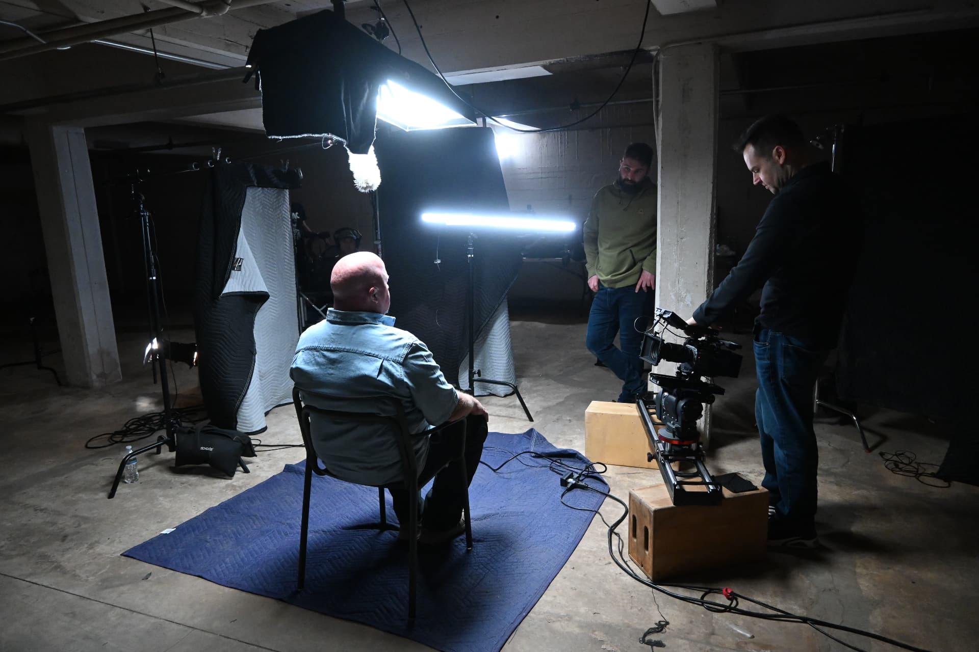 Behind the scenes with Montage Media Production Company: Operator resetting the slider between subjects
