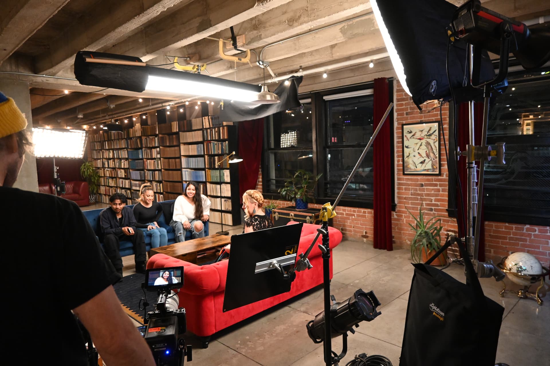 Behind the scenes with Montage Media Production Company: Boom and key light on the ensemble interview