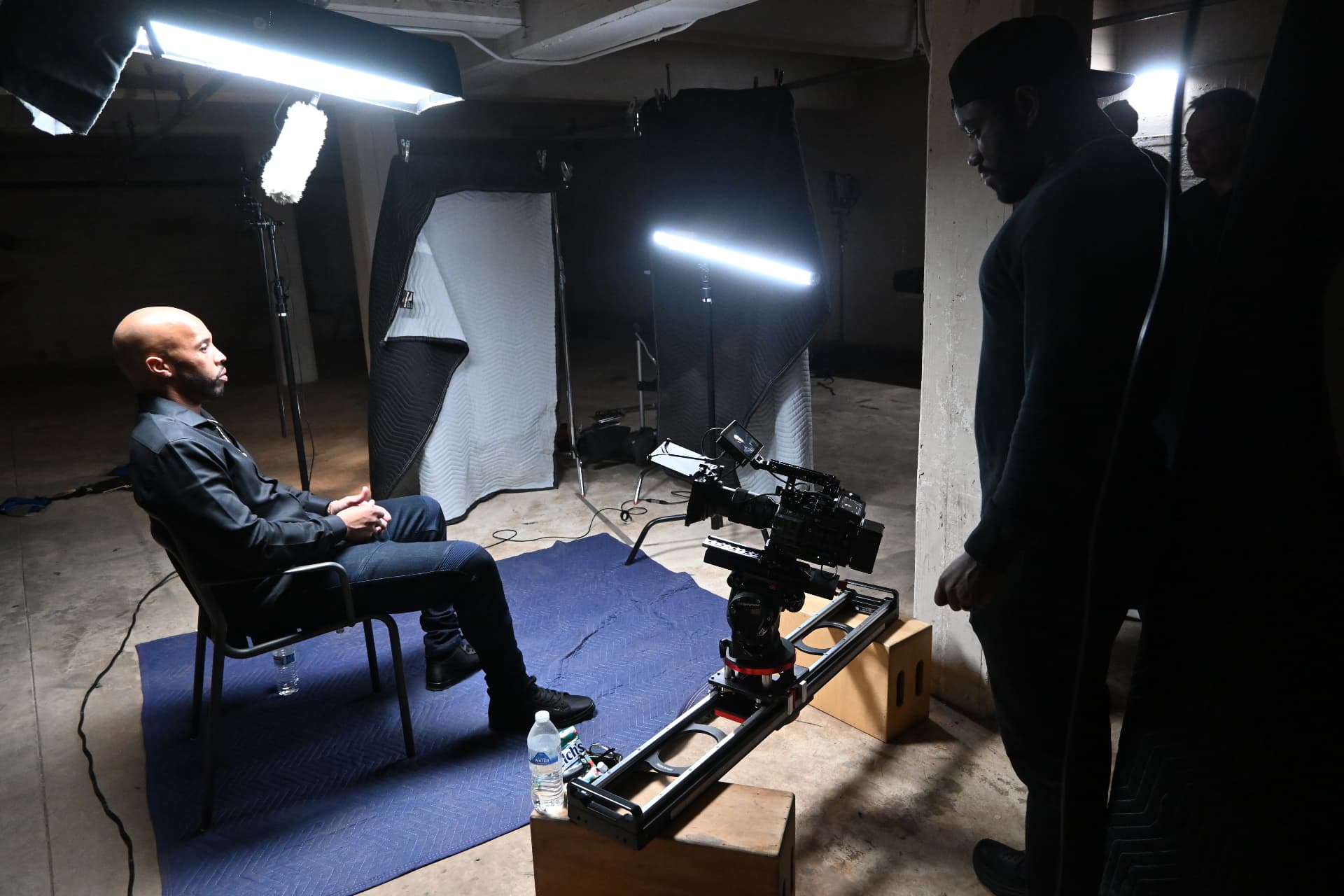 Behind the scenes with Montage Media Production Company: Slider mounted camera on a basement interview