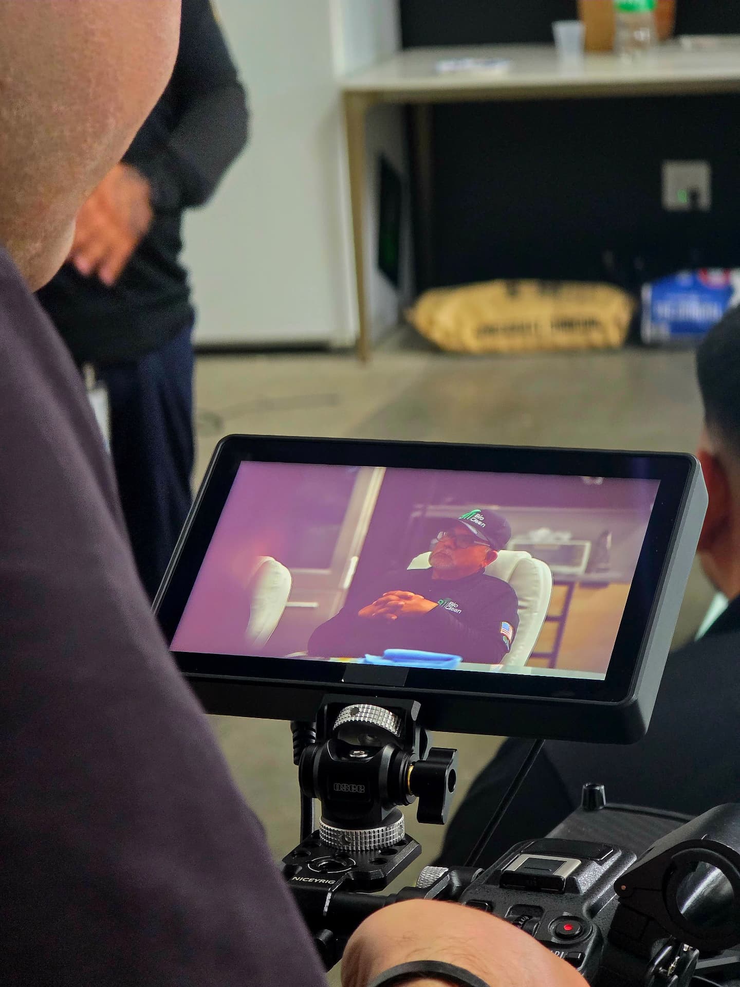Behind the scenes with Montage Media Production Company: Director monitoring an interview setup