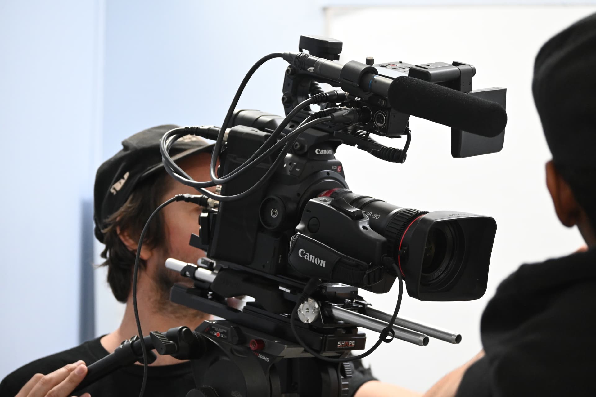 Behind the scenes with Montage Media Production Company: Cinema camera and shotgun mic on the fluid head