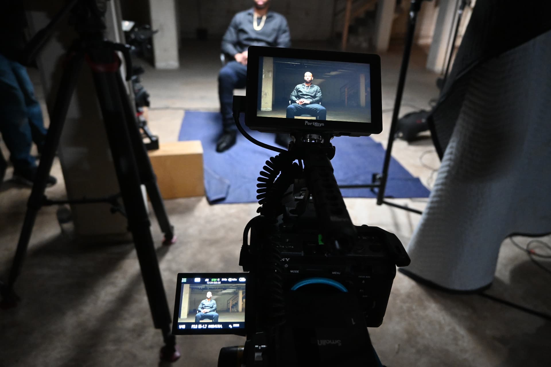 Behind the scenes with Montage Media Production Company: Monitor framing the interview from behind camera