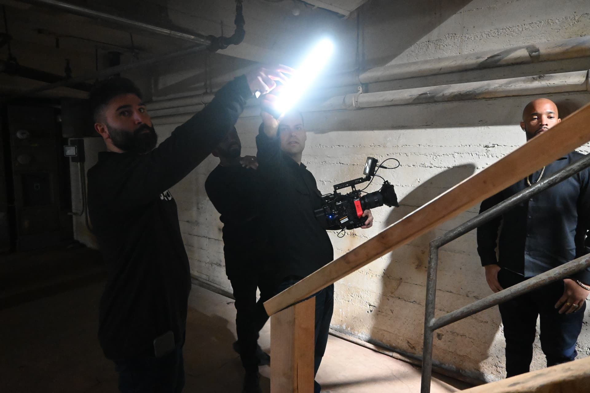 Behind the scenes with Montage Media Production Company: Handheld tube light on a stairwell scene