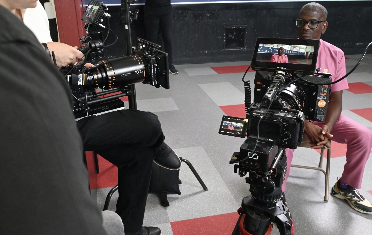Behind the scenes with Montage Media Production Company: Long lens and A camera on an interview subject